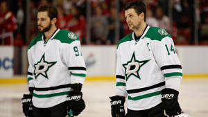 Tyler Seguin And Jamie Benn White Uniform Wallpaper