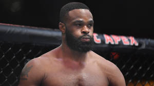 Tyron Woodley Dominating In The Ufc Octagon Wallpaper