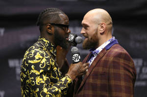 Tyson Fury Versus Deontay Wilder Wallpaper