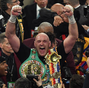 Tyson Fury Yelling For A Triumph Wallpaper