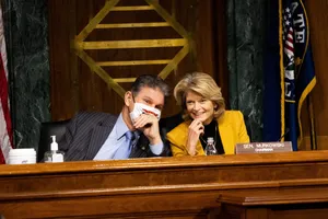 U.s. Senator Lisa Murkowski Sharing A Laugh With A Colleague Wallpaper