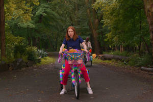 Unbreakable Kimmy Schmidt Kimmy Riding Bike Wallpaper