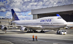 United Airlines Plane On Maintenance Wallpaper