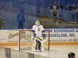 University Of Alaska Fairbanks Ice Hockey Player Wallpaper