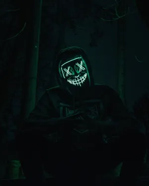 Unleash The Terror - Unmask The Fear With Scary Purge Mask Wallpaper