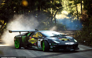 Unstoppable Power - Lamborghini Murcielago In High-octane Drift Action Wallpaper