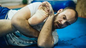 Up Close Action In A Brazilian Jiu-jitsu Match Wallpaper