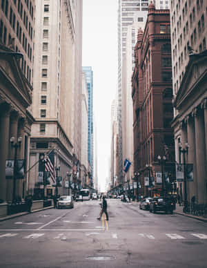 Urban Explorer - Lone Pedestrian Crossing Street Wallpaper