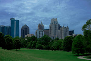 Urban Piedmont Park With Stunning Atlanta Skyline At Dusk Wallpaper