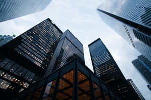 Urban Skyscrapers Looming Overhead Wallpaper