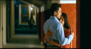 Vaaranam Aayiram Krishnan And Simran Hugging Wallpaper