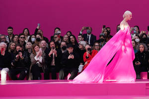 Valentino Model With Flowing Dress Wallpaper