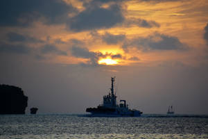 Vanuatu Sunset And Cruise Ship Wallpaper