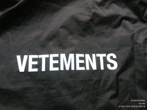 Vetements Print On Black Wallpaper