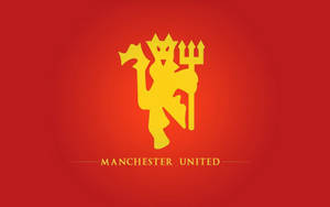 Vibrant And Iconic Manchester United Logo On A Dark Background Wallpaper