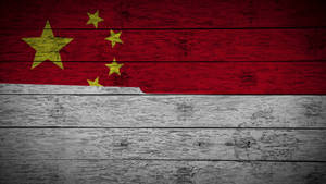 Vibrant China Flag Mounted On Rustic Wood Wallpaper