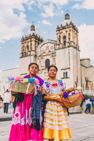 Vibrant Local Fashion In Oaxaca Wallpaper