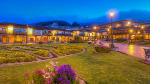 Vibrant Main Square Garden In Cusco, Peru Wallpaper