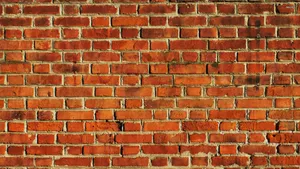 Vibrant Orange Brick Texture Wallpaper
