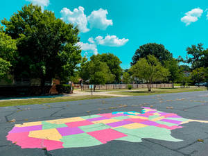 Vibrant Playground Full Of Fun Wallpaper