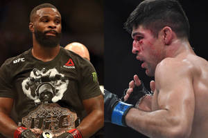 Vicente Luque Lands A Punch On Tyron Woodley During A High-stakes Fight. Wallpaper