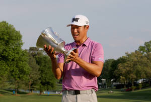 Victorious Moment: James Hahn Holding Trophy Wallpaper