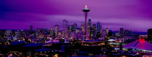 View Of The Beautiful Seattle Skyline At Sunset Wallpaper