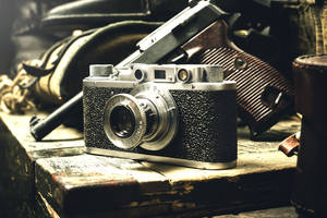 Vintage Camera And Gun Wallpaper