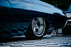 Vintage Car On Checkered Floor Wallpaper