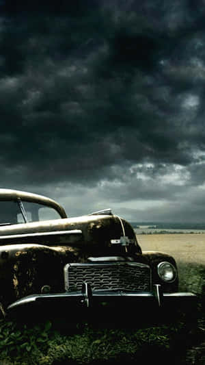 Vintage Car With Dark Sky Iphone Wallpaper