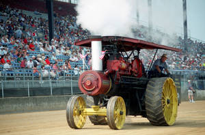 Vintage Elegance - A Restored Tractor At A Show Wallpaper