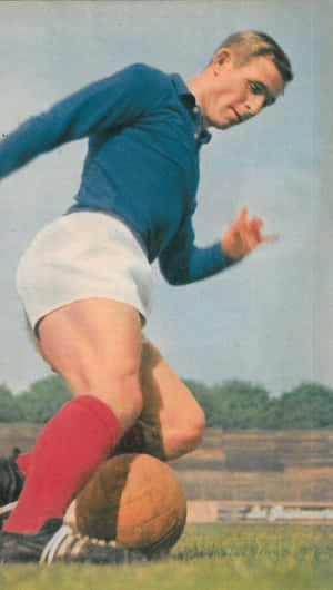 Vintage Football Player Action Shot Wallpaper