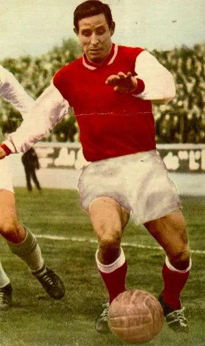 Vintage Footballer Action Shot Wallpaper