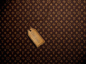 Vintage Louis Vuitton With Leather Tag Wallpaper