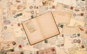 Vintage Postcardsand Open Book Wallpaper