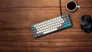 Vintage Styled Computer Keyboard On Wooden Coffee Table Wallpaper