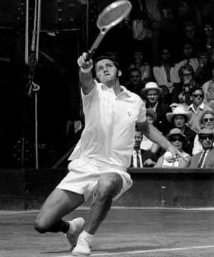 Vintage Tennis Player Action Shot Wallpaper