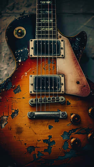 Vintage Worn Electric Guitar Wallpaper