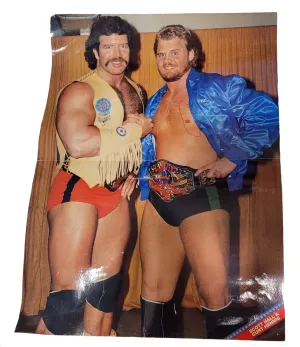 Vintage Wrestlers Pose With Championship Belt Wallpaper