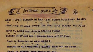 Visionary Wordsmith - Woody Guthrie & His Dust Bowl Blues Lyrics Wallpaper