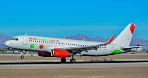 Viva Aerobus On Airport At Morning Wallpaper