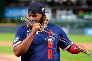 Vladimir Guerrero Jr Kissing Baseball Bat Wallpaper