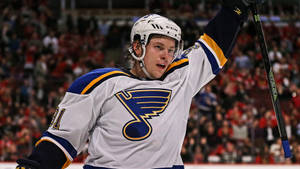 Vladimir Tarasenko Wearing White Team Jersey While Holding Hockey Stick With Left Hand Wallpaper