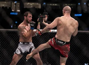 Volkan Oezdemir Kicking Nikita Krylov's Leg Wallpaper