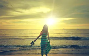 Walking Sad Girl On Beach Wallpaper