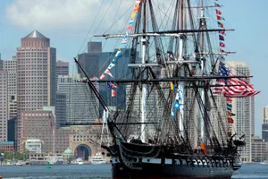 Warship With Different Flags Wallpaper