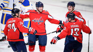 Washington Capitals & John Carlson Strategic Huddle Wallpaper