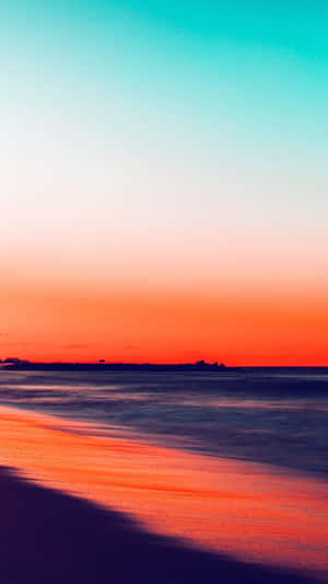 Watch The Sunset Over A Secluded Beach With An Iphone Wallpaper