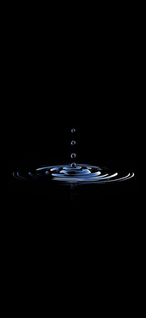 Water Drop On Black Background Wallpaper