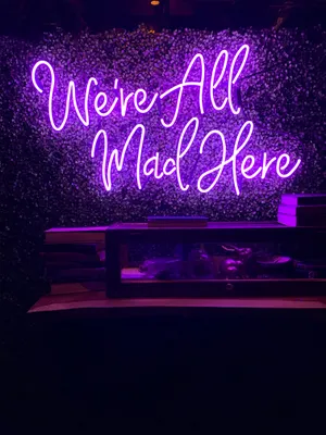 We're All Mad Here Neon Sign Wallpaper